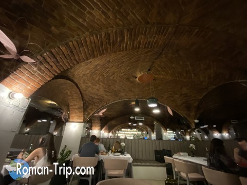 The inviting interior of Boban Restaurant in Zagreb, featuring a warm and cozy atmosphere with elegant decor. This charming space offers a perfect setting for enjoying traditional Croatian dishes and a memorable dining experience.