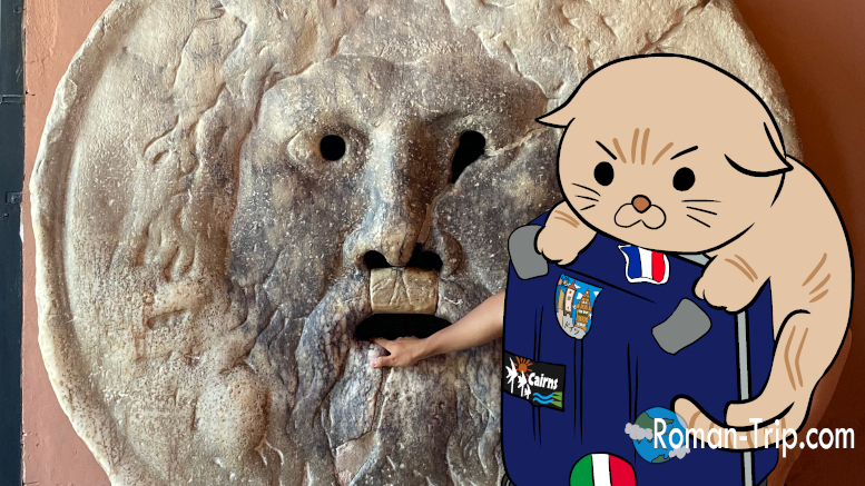 ローマの観光名所「真実の口」で手を入れて記念撮影する筆者。顔は猫のキャラクターで隠してあります。/ Photo of the author posing with a hand in the Mouth of Truth in Rome, with the face hidden by a cat character.