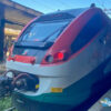 テルミニ駅に停車中のTrenitalia（トレニタリア）の列車。ローマ・フィウミチーノ空港から市内へのアクセス方法や、地下鉄への乗り換え、切符の買い方などをひとり旅の実体験をもとに紹介。/ Trenitalia train at Rome’s Termini Station — sharing a solo traveler's firsthand guide on getting from Fiumicino Airport to the city center, including metro transfers and how to buy tickets.