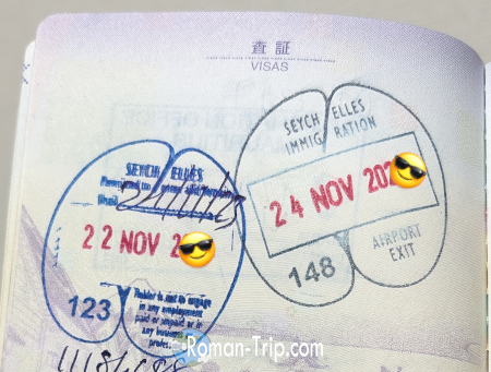 セーシェル入国時にもらったパスポートのスタンプ。ココナッツの形をした可愛らしいデザインが特徴的。 / Passport entry stamp from Seychelles, featuring a charming coconut-shaped design.